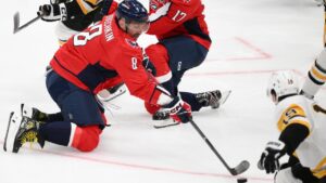 Washington Capitals left wing Alex Ovechkin (8) shoots the puck during the third period of an NHL hockey game against the Pittsburgh Penguins, Wednesday, Oct. 7, 2026, in Washington. (AP Photo/Nick Wass)