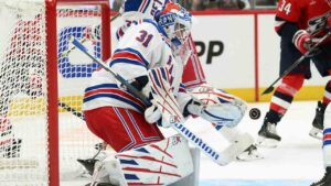 New York Rangers goaltender Igor Shesterkin (31) stops the puck during the first period of an NHL hockey game against the Washington Capitals, Friday, Oct. 9, 2026, in Washington. (Nick Wass/AP)