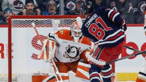 Anaheim Ducks goaltender Lukas Dostal (1) saves the shot from Winnipeg Jets' Kyle Connor (81) during first period NHL hockey action in Winnipeg on Friday, Oct. 9, 2026. (John Woods/CP)
