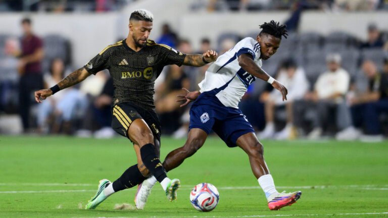 Los Angeles FC forward Denis Bouanga, left, dribbles as Vancouver Whitecaps forward Yadaly Diaby defends him during the first half of an MLS soccer match in Los Angeles, Saturday, Oct. 10, 2026. (Kyusung Gong/AP)