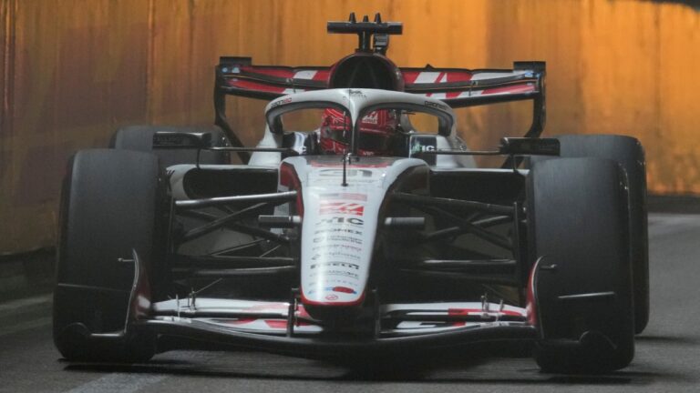 Haas driver Esteban Ocon of France steers his car during the Singapore Formula One Grand Prix race in Singapore, Sunday, Oct. 11, 2026. (AP Photo/Vincent Thian)