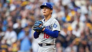 Los Angeles Dodgers pitcher Yoshinobu Yamamoto looks away after giving up a walk during the third inning of Game 2 of baseball's National League Championship Series between the Milwaukee Brewers and the Los Angeles Dodgers, Monday, Oct. 12, 2026, in Milwaukee. (Abbie Parr/AP)