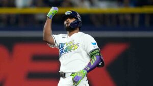 Tampa Bay Rays' Junior Caminero celebrates a double against the Cleveland Guardians during the first inning in Game 2 of an American League Championship Series baseball game in St. Petersburg, Fla. Tuesday, Oct. 13, 2026. (David J. Phillip/AP)