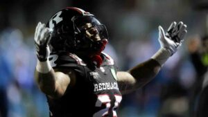 Ottawa Redblacks' Daniel Adeboboye (25) celebrates his touchdown against the Toronto Argonauts during first half CFL action in Ottawa, Friday, Oct. 16, 2026. (Adrian Wyld/CP)