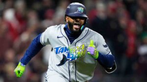 Tampa Bay Rays' Junior Caminero celebrates a RBI-double against the Cleveland Guardians during the sixth inning in Game 4 of an American League Championship Series baseball game in Cleveland, Saturday, Oct. 17, 2026. (David J. Phillip/AP)