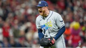 Tampa Bay Rays pitcher Drew Rasmussen celebrates the end of the seventh inning against the Cleveland Guardians in Game 5 of an American League Championship Series baseball game in Cleveland, Sunday, Oct. 18, 2026. (David J. Phillip/AP)
