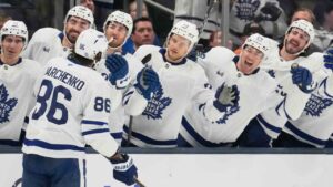 Toronto Maple Leafs right wing Kirill Marchenko (86) is congratulated by his teammates after a goal in the first period of an NHL hockey game against the Columbus Blue Jackets, in Columbus, Ohio, Tuesday, October. 20, 2026. (Sue Ogrocki/AP)