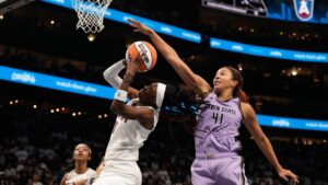 Atlanta Dream guard Rhyne Howard (10) attempts to shoot against Golden State Valkyries center Kiah Stokes (41) in the second half during Game 4 of the WNBA basketball finals on Saturday, Oct. 24, 2026, in Atlanta. (AP Photo/Brynn Anderson)