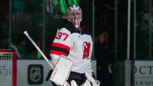New Jersey Devils goaltender Connor Hellebuyck takes the ice prior to an NHL hockey game against the New Jersey Devils, Tuesday, Oct. 27, 2026, in Dallas. (Julio Cortez/AP)