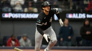 Chicago White Sox's Braden Montgomery (24) watches his 2-run double during the sixth inning of Game 2 of baseball's American League Division Series against the Cleveland Guardians, Monday, Oct. 5, 2026, in Cleveland. (Sue Ogrocki/AP)
