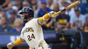 Milwaukee Brewers catcher William Contreras follows through on his RBI base hit during the first inning of Game 2 of baseball's National League Championship Series between the Milwaukee Brewers and the Los Angeles Dodgers, Monday, Oct. 12, 2026, in Milwaukee. (Abbie Parr/AP)
