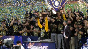 Milwaukee Brewers catcher William Contreras holds the MVP trophy after they won baseball's World Series against the Tampa Bay Rays, Wednesday, Oct. 28, 2026, in St. Petersburg, Fla. (Phelan M. Ebenhack/AP)