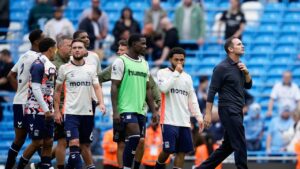 Coventry City's head coach Frank Lampard, right, leaves the field with his players after the English Premier League soccer match between Manchester City and Coventry City in Manchester, England, Saturday, Sept. 5, 2026. (Dave Thompson/AP)