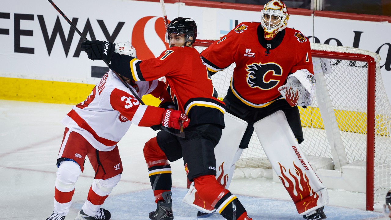 Flames pay tribute to 2004 team with workmanlike victory