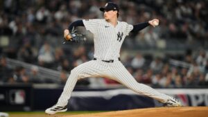 New York Yankees pitcher Max Fried throws to the Tampa Bay Rays during the first inning in Game 3 of baseball's American League Division Series, Wednesday, Oct. 7, 2026, in New York. (AP Photo/Yuki Iwamura)