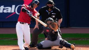 Cleveland Guardians' Petey Halpin hits a two-run home run during the fifth inning in Game 3 of an American League Championship Series baseball game against the Tampa Bay Rays in Cleveland, Thursday, Oct. 15, 2026. (AP Photo/Sue Ogrocki)