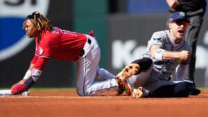 Tampa Bay Rays shortstop Taylor Walls reacts after tagging out Cleveland Guardians' José Ramírez during the first inning in Game 3 of an American League Championship Series baseball game in Cleveland, Thursday, Oct. 15, 2026. (David J. Phillip/AP)
