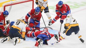 Nashville Predators' Matthew Wood (71) moves in to score against Montreal Canadiens goaltender Jacob Fowler (32) during second period NHL hockey action in Montreal on Thursday, Oct. 8, 2026. (Graham Hughes/CP)