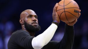 Philadelphia 76ers' LeBron James warms up before a preseason NBA basketball game against the Brooklyn Nets, Thursday, Oct. 8, 2026, in New York. (AP Photo/Pamela Smith)