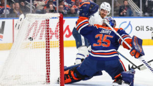Edmonton Oilers goaltender Tristan Jarry (35) can't stop Toronto Maple Leafs' Jack Roslovic (96) from scoring during first period NHL action in Edmonton on Saturday, Oct. 24, 2026. (Codie McLachlan/CP)