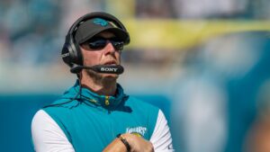 Jacksonville Jaguars head coach Liam Coen walks the sideline during an NFL football game against the New England Patriots in Jacksonville, Fla., Sunday, Sept. 27, 2026. (AP Photo/Gary McCullough)