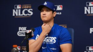 Los Angeles Dodgers' Shohei Ohtani attends a news conference ahead of Game 3 of baseball's National League Championship Series against the Milwaukee Brewers, Tuesday, Oct. 13, 2026, in Los Angeles. (Jae C. Hong/AP)