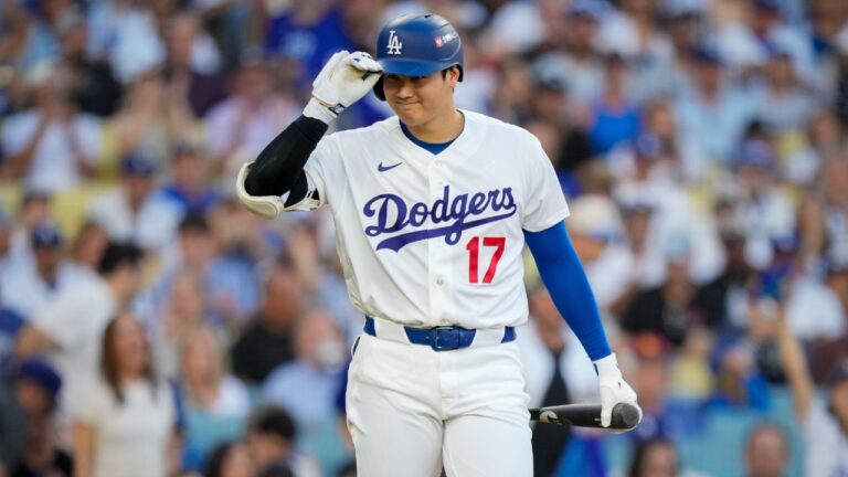 Los Angeles Dodgers designated hitter Shohei Ohtani tips his helmet towards the Milwaukee Brewers dugout during the first inning of Game 4 of baseball's National League Championship Series between the Milwaukee Brewers and the Los Angeles Dodgers, Thursday, Oct. 15, 2026, in Los Angeles. (Ashley Landis/AP)