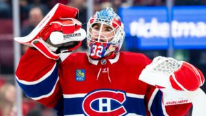 Montreal Canadiens goaltender Jacob Fowler (32) drinks water during a break in play in second period NHL pre-season hockey action against the Toronto Maple Leafs, in Montreal, on Saturday, Sept. 19, 2026. (Christopher Katsarov/CP)