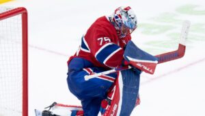 Montreal Canadiens goaltender Jakub Dobes (75) reacts in his crease following a goal by San Jose Sharks' Macklin Celebrini (not shown) during overtime NHL hockey action in Montreal on Tuesday, Oct. 20, 2026. (Christinne Muschi/CP)