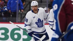 Toronto Maple Leafs right wing William Nylander, is congratulated after scoring against Colorado Avalanche goaltender Mackenzie Blackwood in the second period of an NHL hockey game Saturday, Oct. 10, 2026, in Denver. (AP Photo/David Zalubowski)