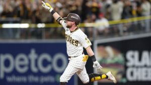 San Diego Padres' Jake Cronenworth celebrates as he rounds the bases after hitting a solo home run during the fifth inning in Game 3 of baseball's National League Division Series against the Milwaukee Brewers Tuesday, Oct. 6, 2026, in San Diego. (AP Photo/Derrick Tuskan)