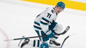 San Jose Sharks' Macklin Celebrini (71) celebrates his game-winning goal over the Montreal Canadiens during overtime NHL hockey action in Montreal on Tuesday, Oct. 20, 2026. (Christinne Muschi/CP)