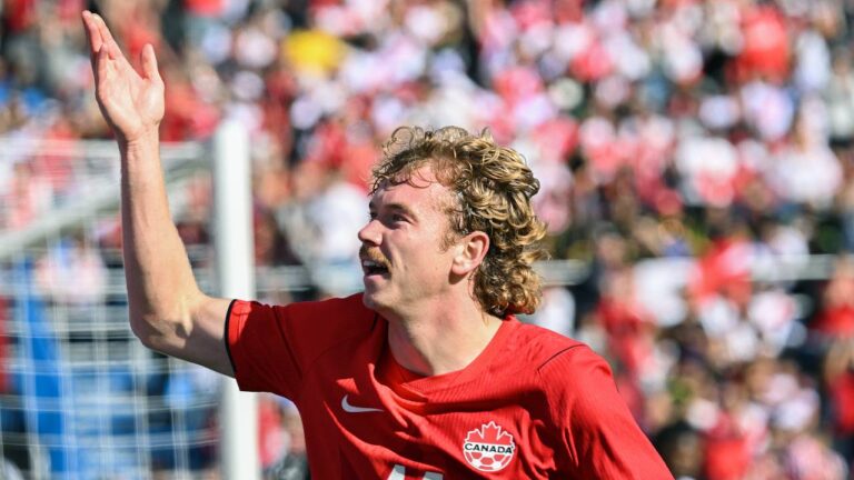Canada's Jacob Shaffelburg (14) celebrates after scoring against Peru during first half International friendly soccer action in Montreal, on Saturday, Oct. 3, 2026. (Graham Hughes/CP)