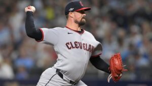 Cleveland Guardians pitcher Shawn Armstrong throws against the Tampa Bay Rays during the seventh inning in Game 2 of an American League Championship Series baseball game in St. Petersburg, Fla. Tuesday, Oct. 13, 2026. (AP Photo/Phelan M. Ebenhack)