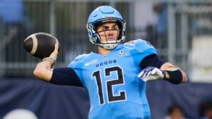 Toronto Argonauts quarterback Chad Kelly (12) passes during first half CFL football action against the Calgary Stampeders in Toronto, on Thursday, Aug. 6, 2026. (Sammy Kogan/CP)
