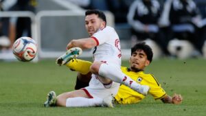 Columbus Crew's Taha Habroune, right, kicks the ball away from Toronto FC's Lewis Morgan during the second half of an MLS soccer match, Saturday, Oct. 24, 2026, in Columbus, Ohio. (AP Photo/Jay LaPrete)
