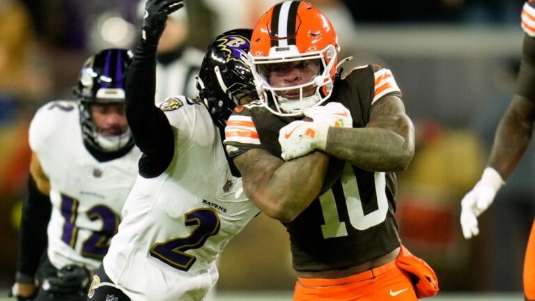 Cleveland Browns running back Quinshon Judkins (10) runs the ball as Baltimore Ravens' Nate Wiggins (2) attempts to make the stop in the second half of an NFL football game in Cleveland, Sunday, Nov. 16, 2025. (Sue Ogrocki/AP)