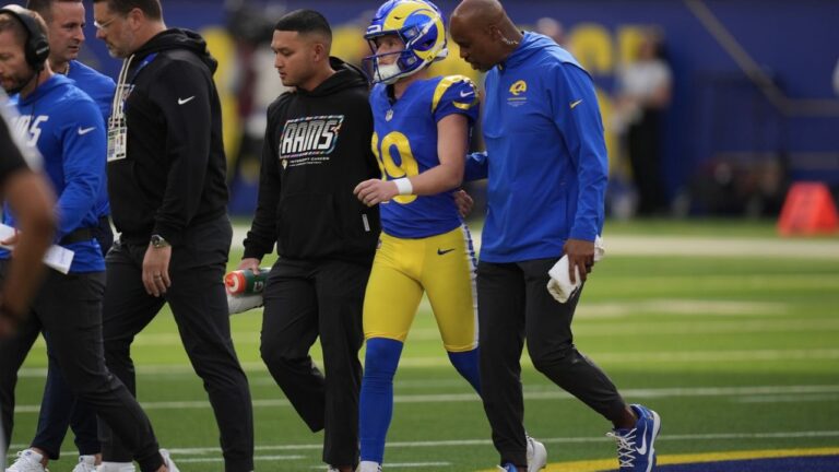 Los Angeles Rams kicker Blake Grupe (19) walks off the field with trainers during the first half of an NFL football game against the Arizona Cardinals in Inglewood, Calif., Sunday, Oct. 18, 2026. (Gregory Bull/AP)