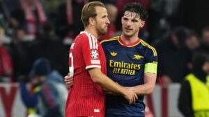 Bayern's Harry Kane, left, and Arsenal's Declan Rice talk after the UEFA Champions League soccer match between Bayern and Arsenal in Munich Germany, Wednesday, Oct. 21, 2026. (Martin Meissner/AP)