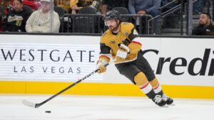Vegas Golden Knights defenseman Rasmus Andersson (4) plays against the Chicago Blackhawks during an NHL hockey game Tuesday, Sept. 29, 2026, in Las Vegas. (AP Photo/John Locher)