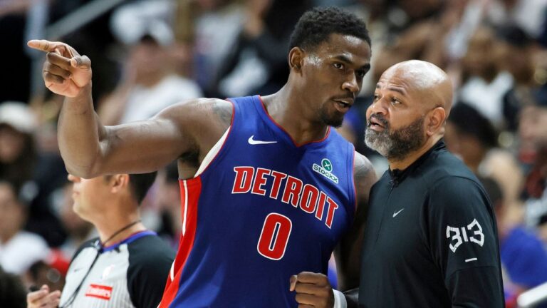 Detroit Pistons center Jalen Duren (0) talks with head coach J.B. Bickerstaff during the first half in Game 7 of a second-round NBA playoffs basketball series Sunday, May 17, 2026, in Detroit. (AP Photo/Duane Burleson)