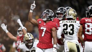 Atlanta Falcons running back Bijan Robinson (7) celebrates after scoring against the New Orleans Saints during the first half of an NFL football game in New Orleans, Monday, Oct. 5, 2026. (AP Photo/Ella Hall)