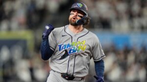 Tampa Bay Rays' Ryan Vilade celebrates his solo home run durin the fourth inning in Game 3 of baseball's American League Division Series against the New York Yankees, Wednesday, Oct. 7, 2026, in New York. (AP Photo/Seth Wenig)
