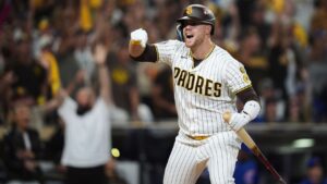 San Diego Padres Gavin Sheets celebrates his two-run home run against the Chicago Cubs in the fourth inning of Game 2 of the National League Wild Card baseball playoff series Wednesday, Sept. 30, 2026, in San Diego. (AP Photo/Gregory Bull)