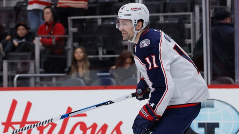 Columbus Blue Jackets left wing Miles Wood (11) smiles afte4r scoring against the Detroit Red Wings during the second period of an NHL hockey game Saturday, Nov. 22, 2025, in Detroit. (AP Photo/Duane Burleson)