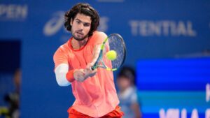 Spain's Carlos Alcaraz returns to Czechia's Jiri Lehecka during their men's singles final at the Japan Open tennis tournament in Tokyo, Tuesday, Oct. 6, 2026. (AP Photo/Eugene Hoshiko)