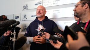 Mike Pettine, the Dallas Cowboys senior defensive assistant, responds to questions during a news conference after a practice at the NFL football team's headquarters, Friday, Oct. 16, 2026, in Frisco, Texas. (Tony Gutierrez/AP)