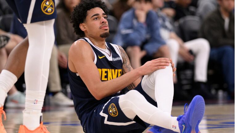 Denver Nuggets guard Julian Strawther reacts after getting injured during the second half of a preseason NBA basketball game against the Los Angeles Clippers Wednesday, Oct. 14, 2026, in Inglewood, Calif. (Kyusung Gong/AP)
