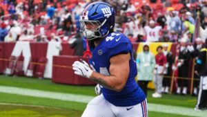 New York Giants' Cam Skattebo (44) takes the field for an NFL football game against the Washington Commanders in Landover, Md., Sunday, Oct. 11, 2026. (AP Photo/Stephanie Scarbrough)
