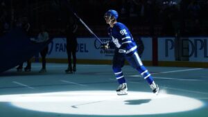 Toronto Maple Leafs' Gavin McKenna celebrates being named the first star of the game after defeating the Nashville Predators in overtime NHL action in Toronto on Tuesday, Oct. 6, 2026. (Nathan Denette/CP)